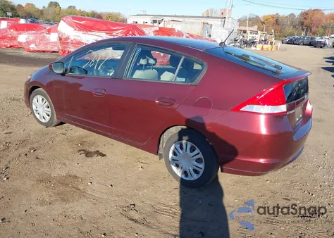 2011 Honda Insight from USA, damaged, VIN JHMZE2H38BS007335